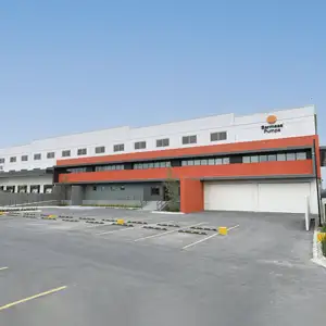 Fachada de un edificio con el logotipo de Barmesa Pumps.